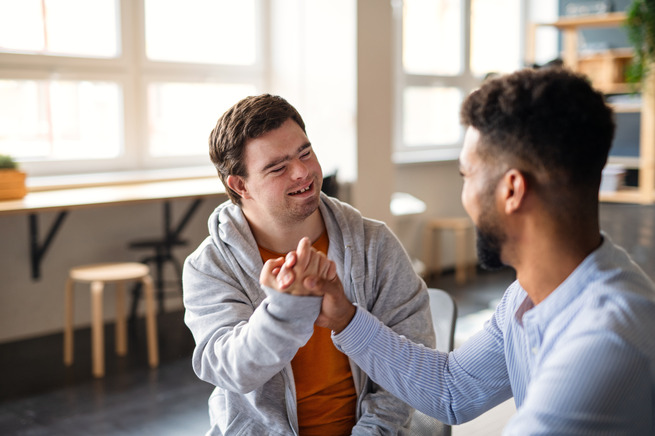 Young man with his carer